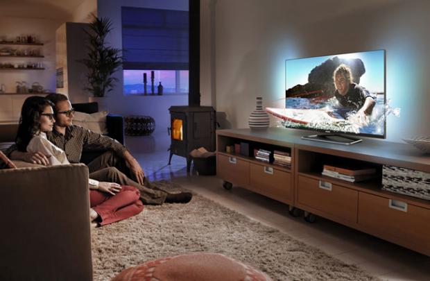 Телевизор на подставке в интерьере гостиной