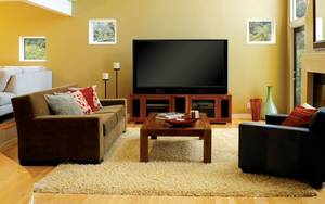 Без телевизора интерьер гостиной трудно представить